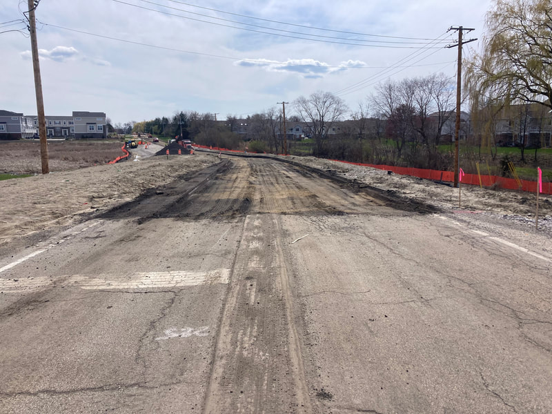 Looking south from the railroad tracks; pavement removal completed to Timberleaf Circle